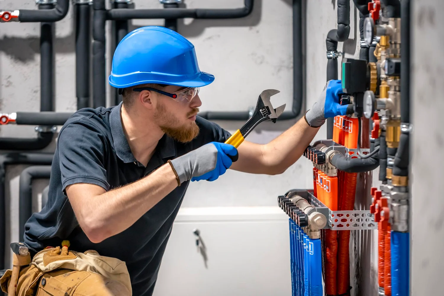 technician-checking-heating-system-boiler-room